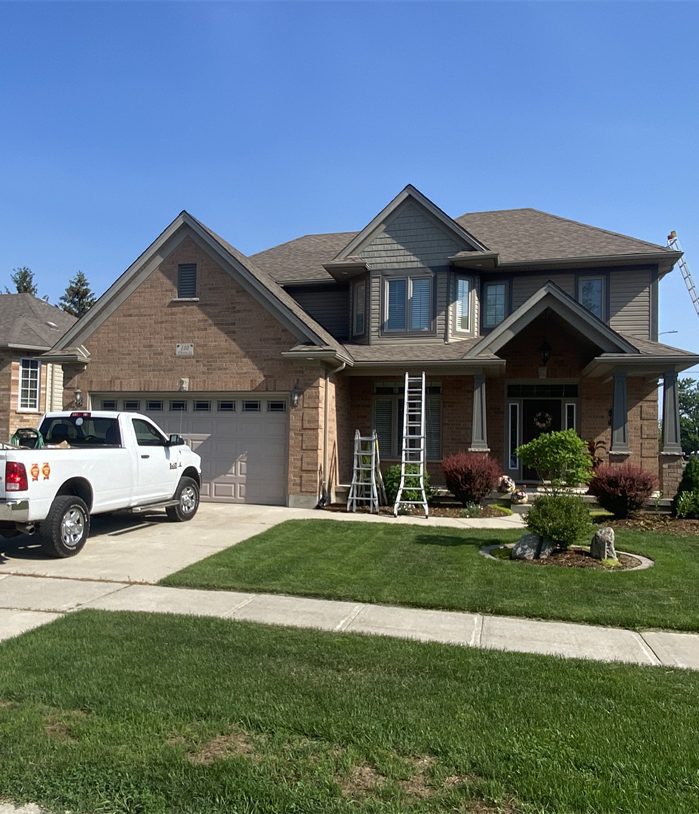 2 story house with multiple peaks and eavestroughs to clean