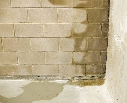 Rain water leaks on the wall causing damage in basement due to eavestrough problems