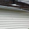 fascia board rot repair required for water damage and hanging gutters